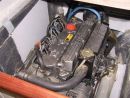 4 cylinder diesel engine gives 48 BHP. 
Make & model is Lombardini LDW 2004M